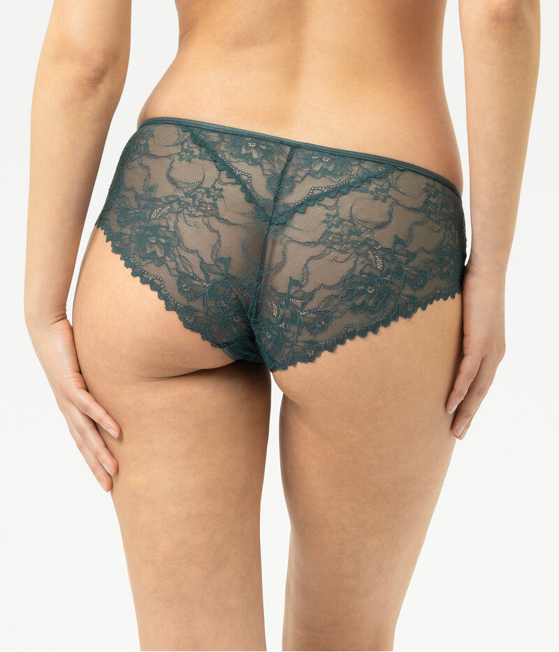 Teal lace lingerie set on a plain background