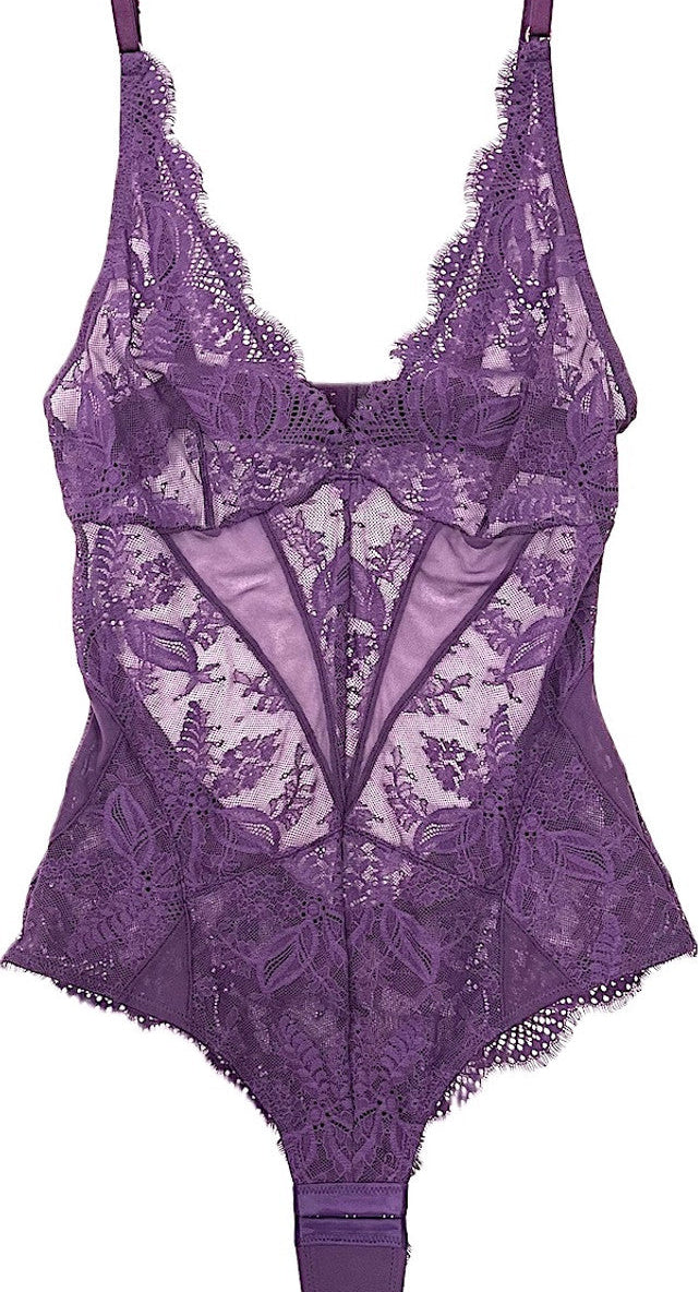 A purple lace thong bodysuit with adjustable straps and intricate floral patterns.