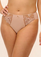Beige lace underwear on a beige background